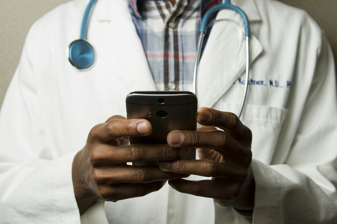 Healthcare professional using a digital care system